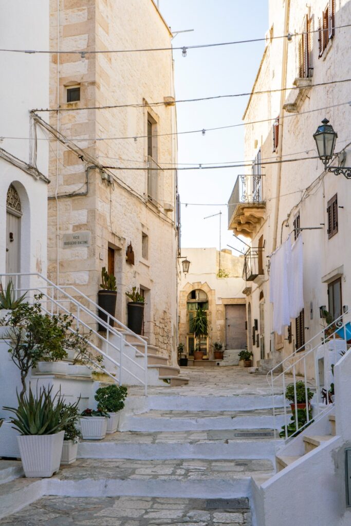 A beautiful white-washed alleyway in italy.
